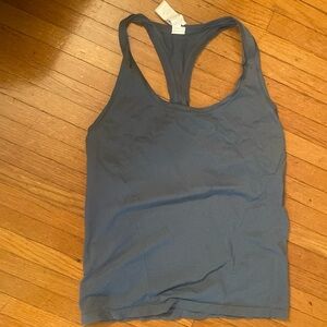 Worn only once!  Cute seafoam green featherweight top